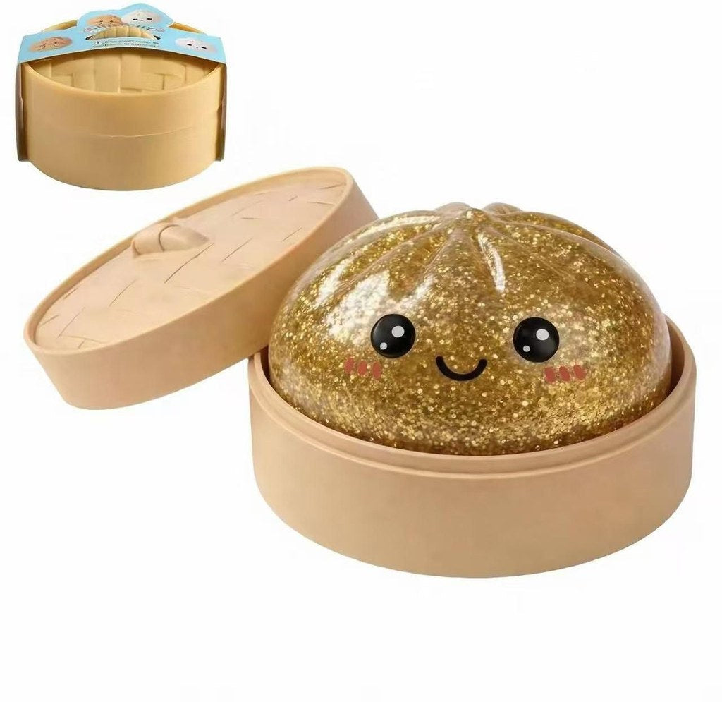 Dumpling Squishy Dourado com Brilhantes em Cesto
