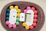 Puzzle de Bolinhas Oval - Castanho
