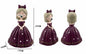 Figura Decorativa Menina com Pastilha Elástica Vestido Bordô