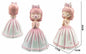 Figura Decorativa Menina com Pastilha Elástica Vestido Rosa